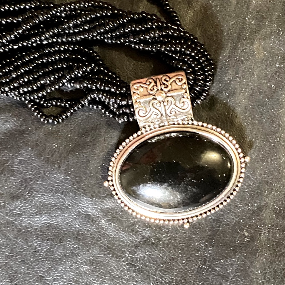 Multi-strand , Black Glass Seed Bead Necklace with pendant.